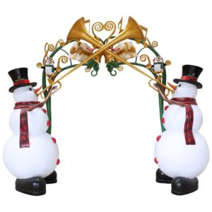 A large green archway with gold music notes and tow trumpet playing snowmen on either side.