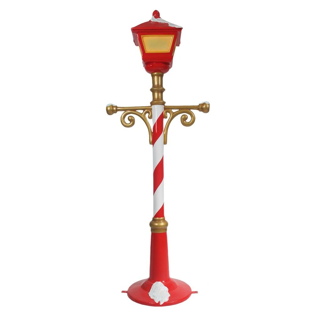A large red and white cartoon style lamp post.