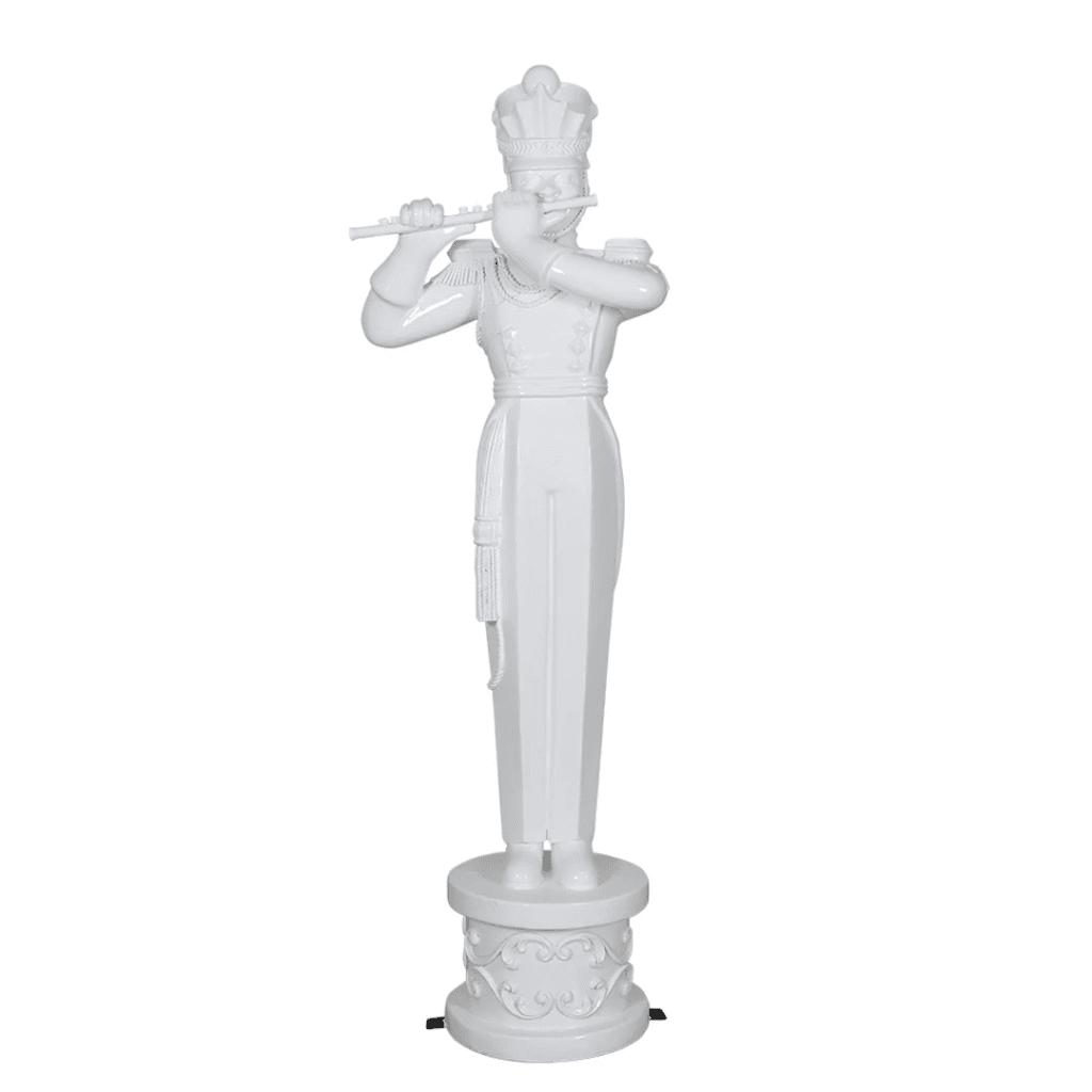 A white toy soldier on a decorative base, playing the flute.