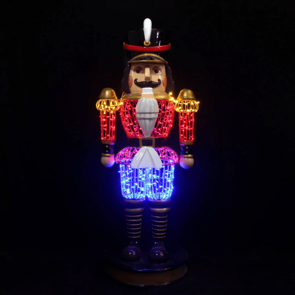 A large nutcracker made of red, blue, and yellow lights.
