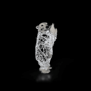 A standing baby polar bear made of white lights.