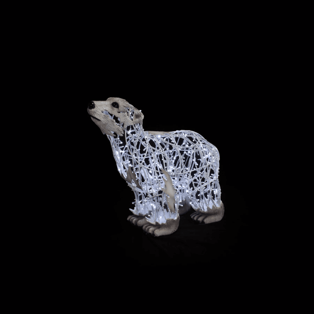 A standing baby polar bear made of white lights.