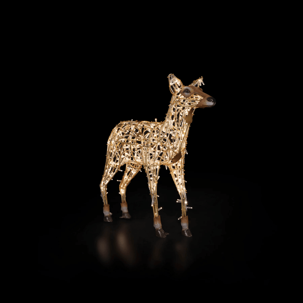 A large fawn made of lights, standing up.