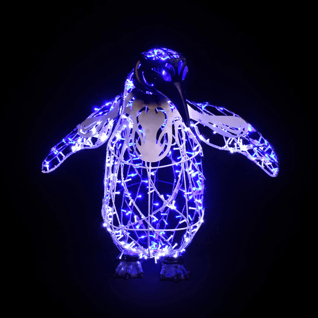 A large penguin made of blue lights.