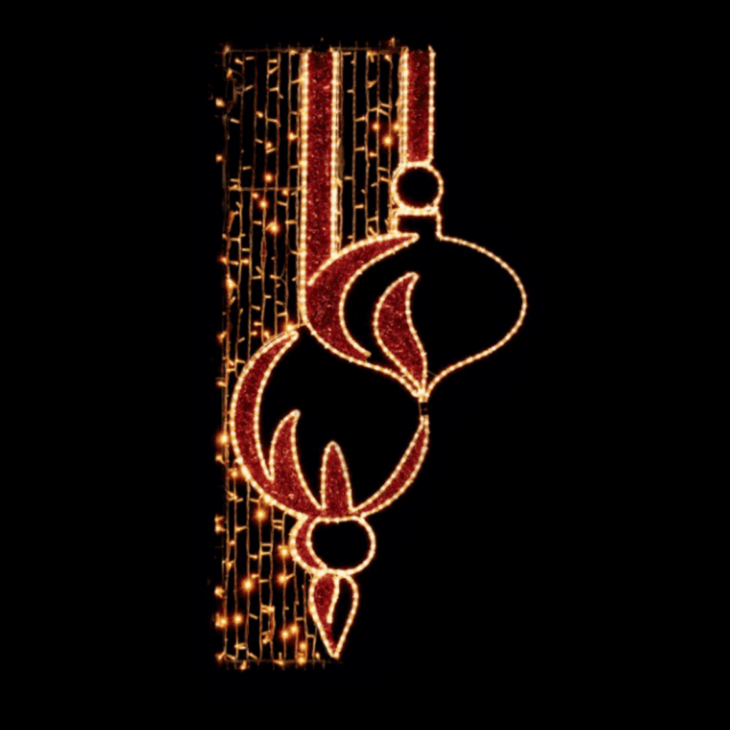 Hanging Christmas ornaments made of warm white lights and red tinsel.