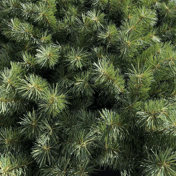 A close up of an artificial tree's needles.