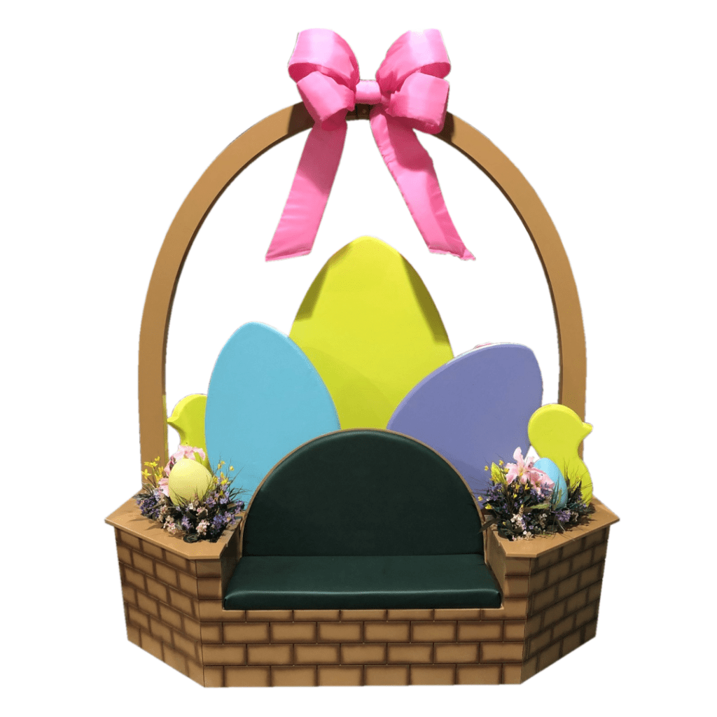 A large easter basket with painted eggs and candy.