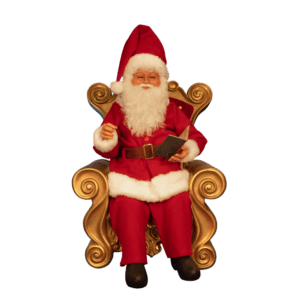 Santa Sitting in Chair, Reading Book