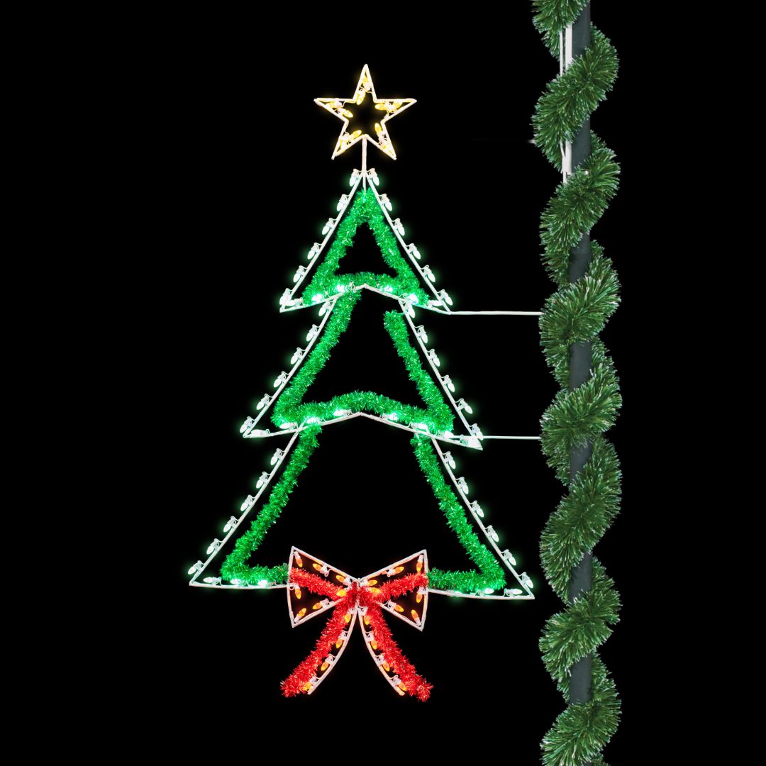 A silhouette Christmas light display of a Christmas tree with sparkling garland accents.