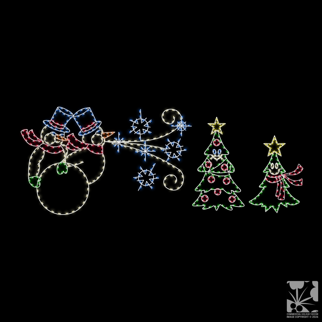 A lighted Christmas silhouette of a snowman blowing snowflakes at two shivering trees.