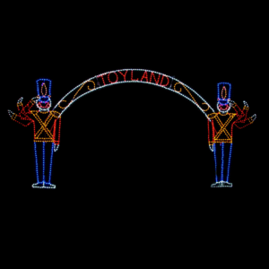 A lighted Christmas silhouette of an arch with the words toy land, with a saluting toy soldier on either side.