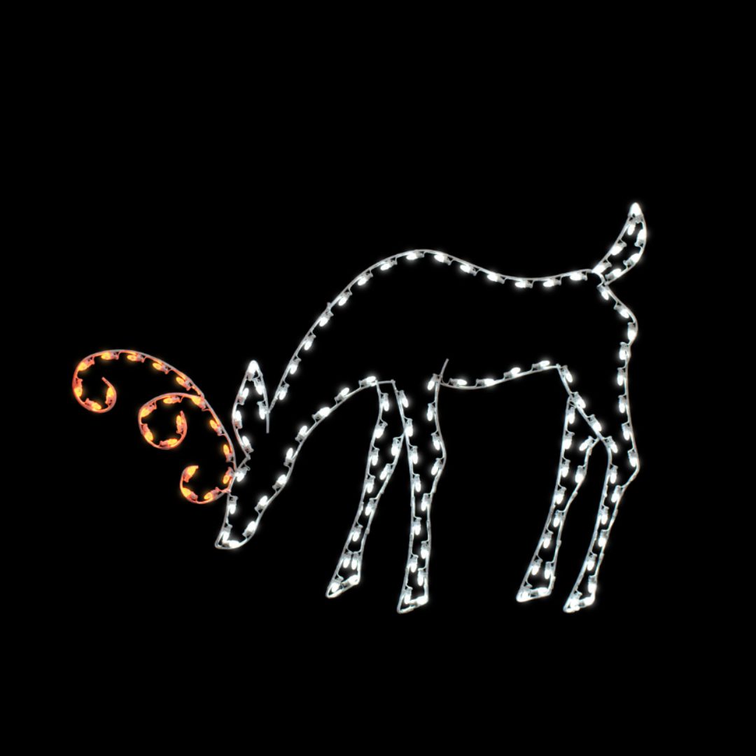 A lighted Christmas silhouette of a deer with a yellow swirl antler with its head down, drinking.