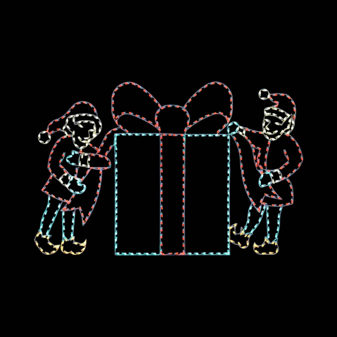 A lighted Christmas silhouette of two elves tying a red bow on a giant green gift box.