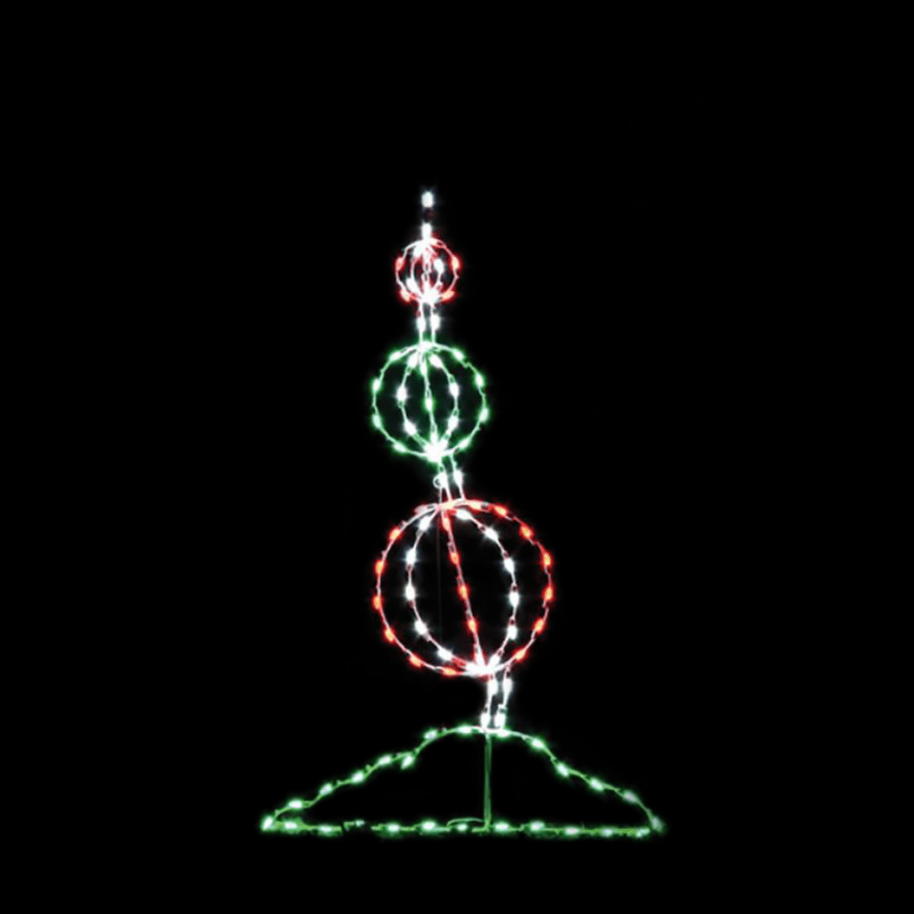 A lighted Christmas silhouette of a tree made of three candy gum drops.