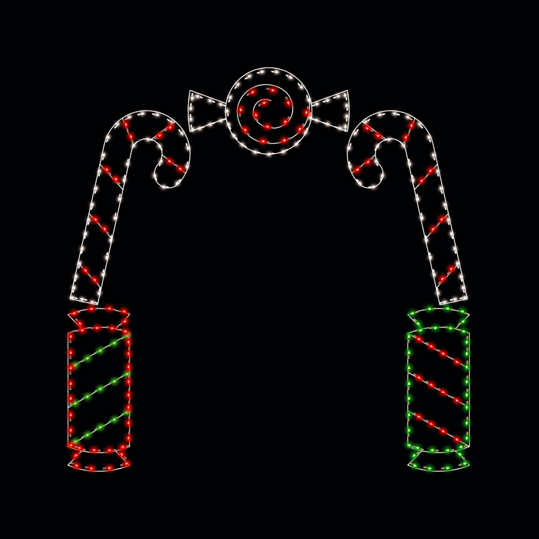 A lighted Christmas silhouette of a candy archway with a red and white wrapped peppermint on top of two red and white candy canes, on top of two red and green wrapped candies.
