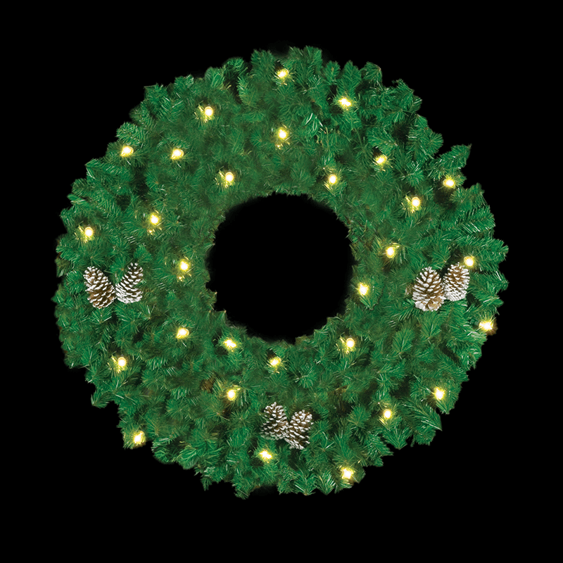 A wreath made of green pine garland with warm white C7 LED lights and pine cone.