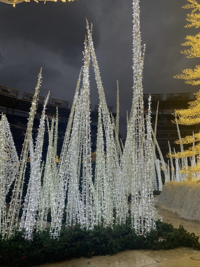 An image of tall, white shards of ice made from a white metal frame, and LED lighting.