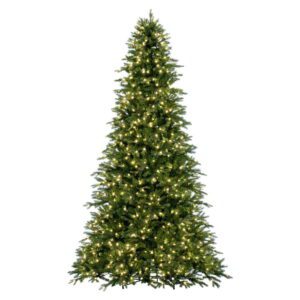 An image of a green artificial green Christmas tree pre-lit with warm white mini LED Christmas lights.