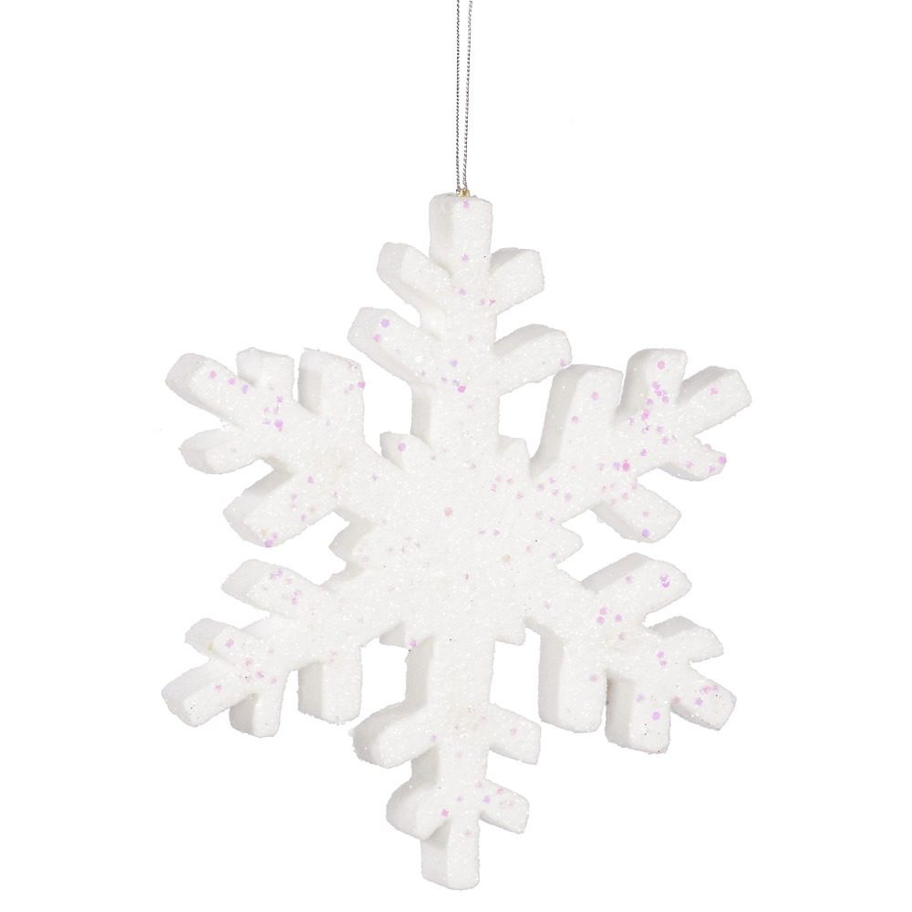An image of a small white foam snowflake covered in glitter.