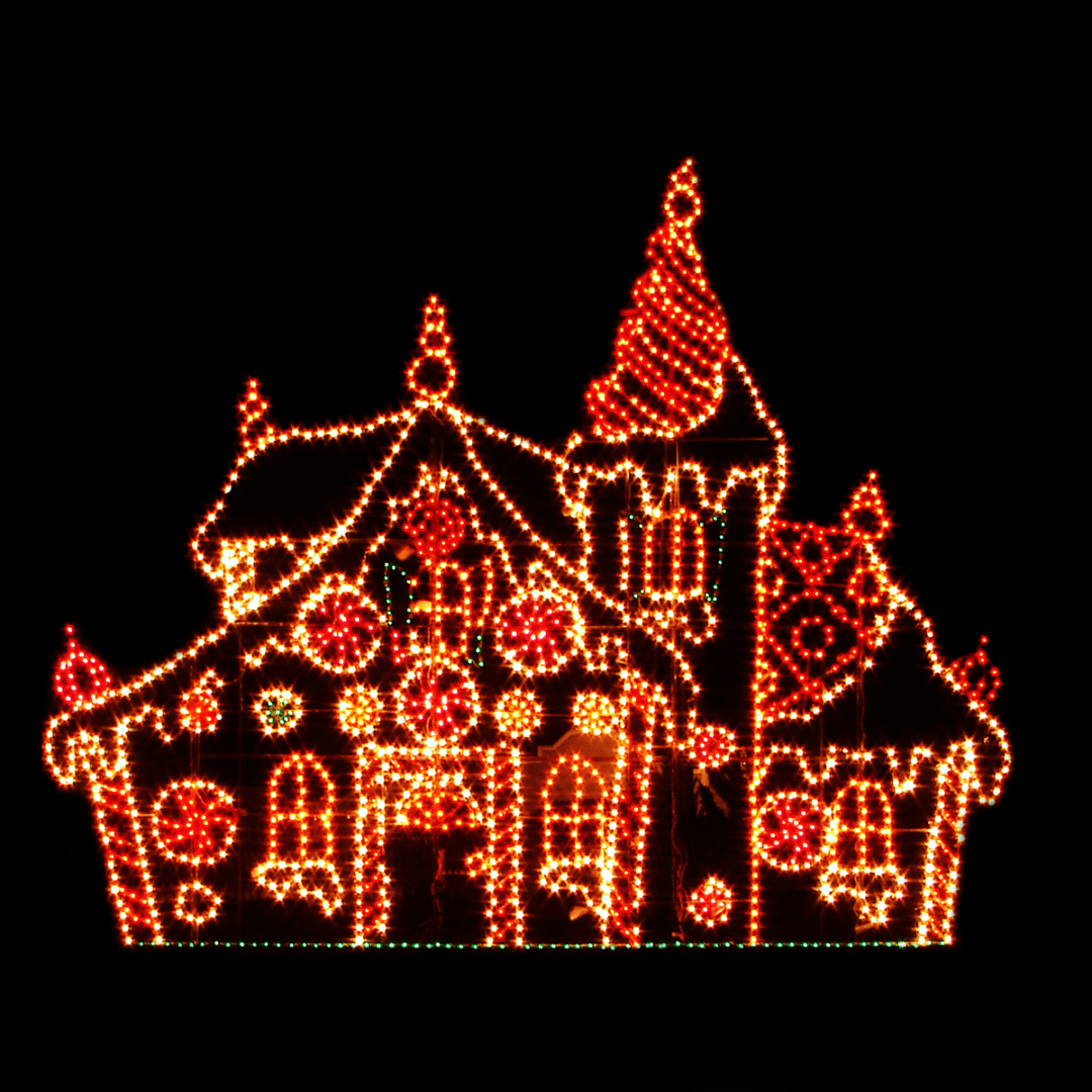 A large Christmas light silhouette of an elegant gingerbread house.