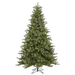 A green artificial Christmas tree pre-lit with multi colored mini LED lights.