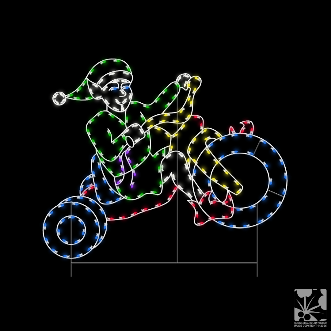 A Christmas light silhouette of a Christmas elf in green colored clothing on a big wheel style kids bike.