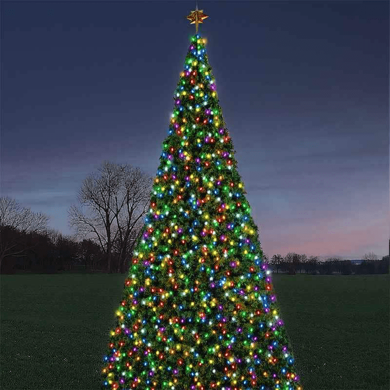 A large artificial Christmas tree lighted with multi-colored C9 LED lights.