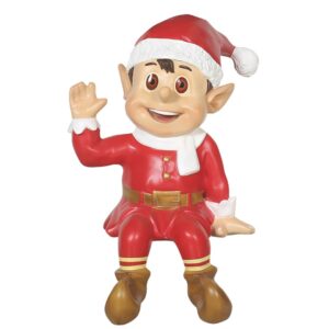 A fiberglass figure of a small Christmas elf sitting, and waving.