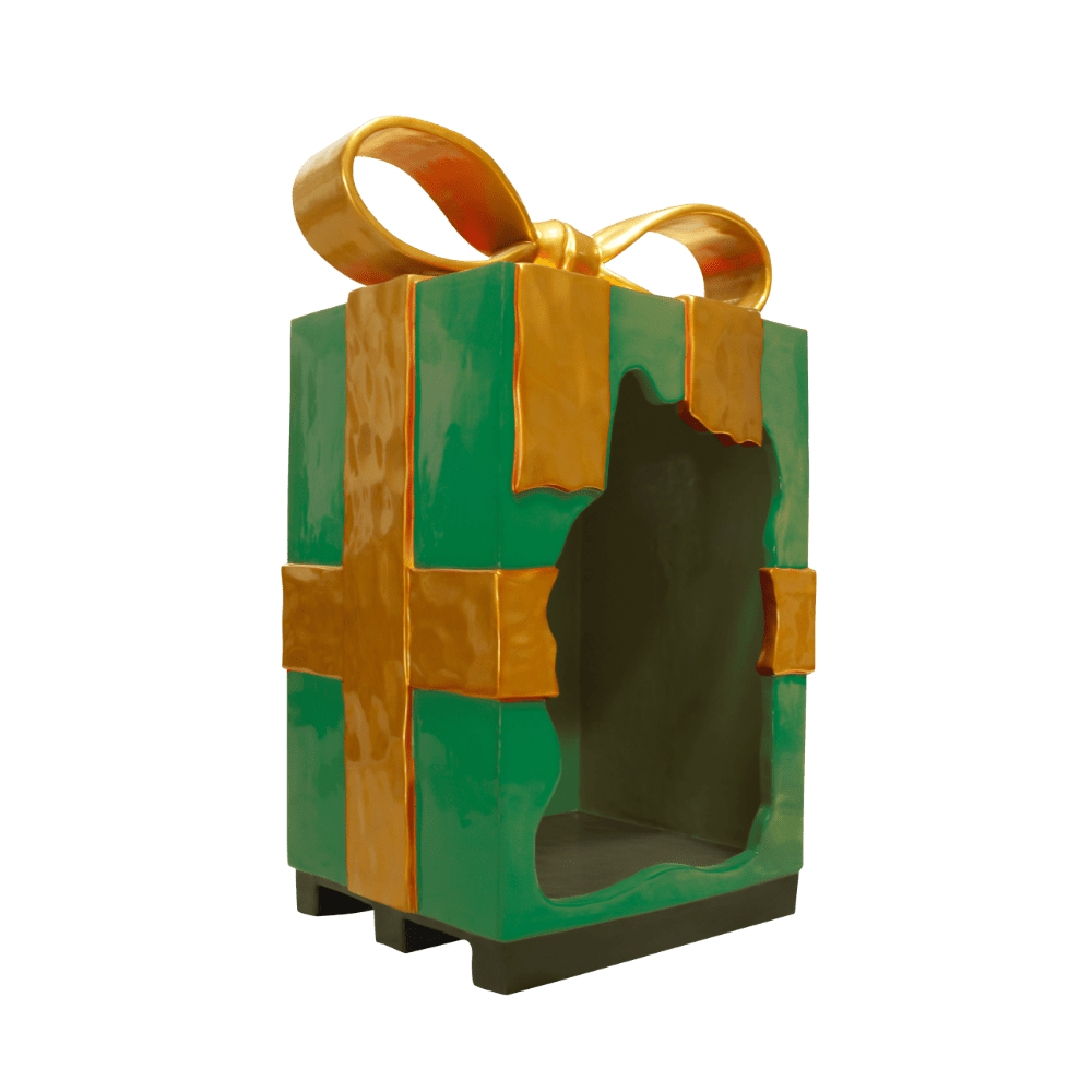 A large green Christmas parcel with a gold bow, torn open in the middle.
