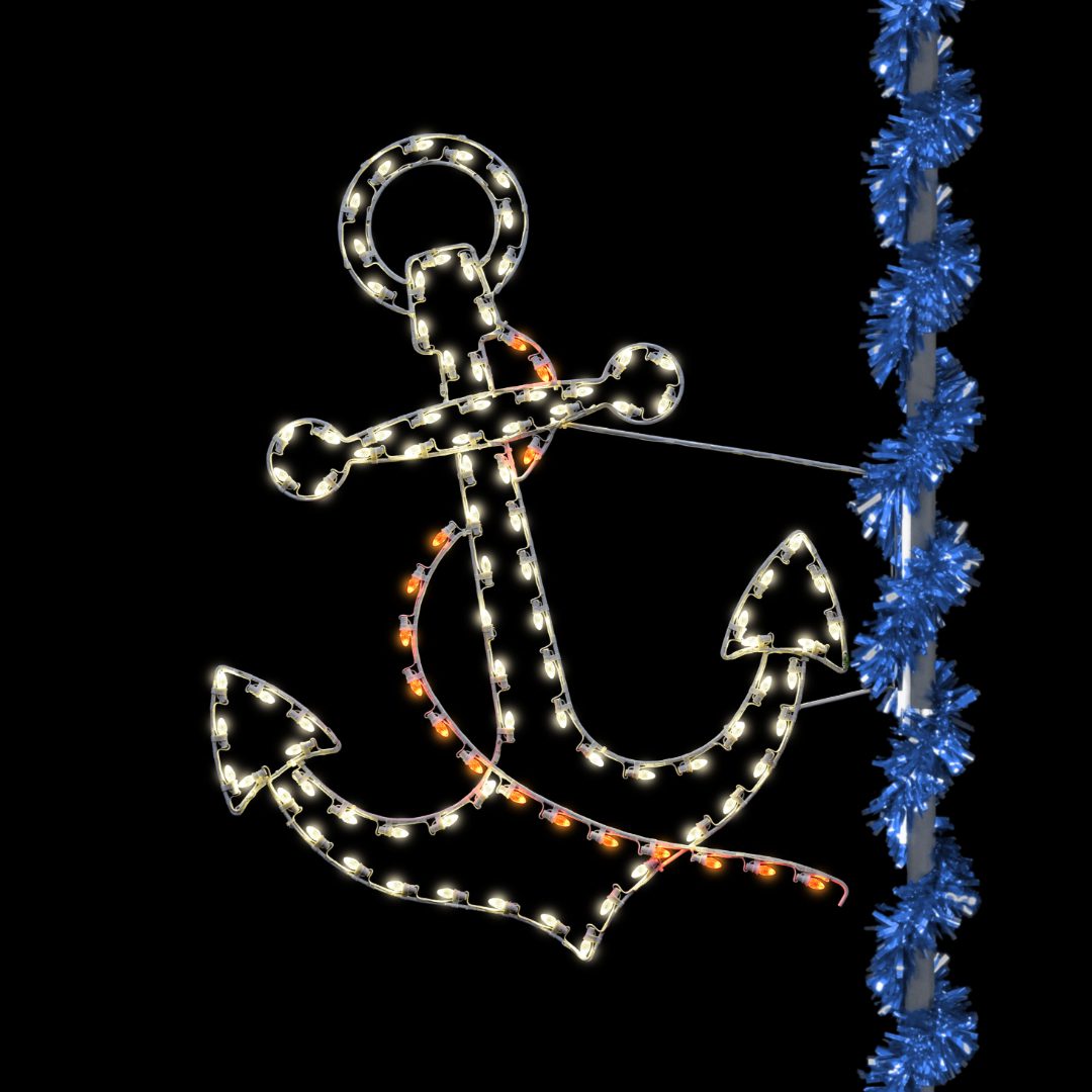A Christmas light silhouette of an anchor, mounted on a light pole wrapped with blue Christmas garland.