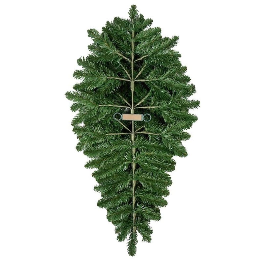 The back of a column spray made from artificial Christmas greenery.