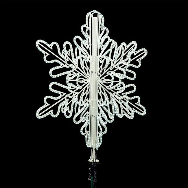 A 3D snowflake made from pure white rope light.