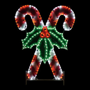 A Christmas light display of two crossed garland, red and white candy canes with green holly leaves and red berries in the middle.