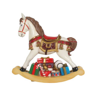 A fiberglass figure of a white rocking horse with red and gold embellishments with Christmas presents beneath.